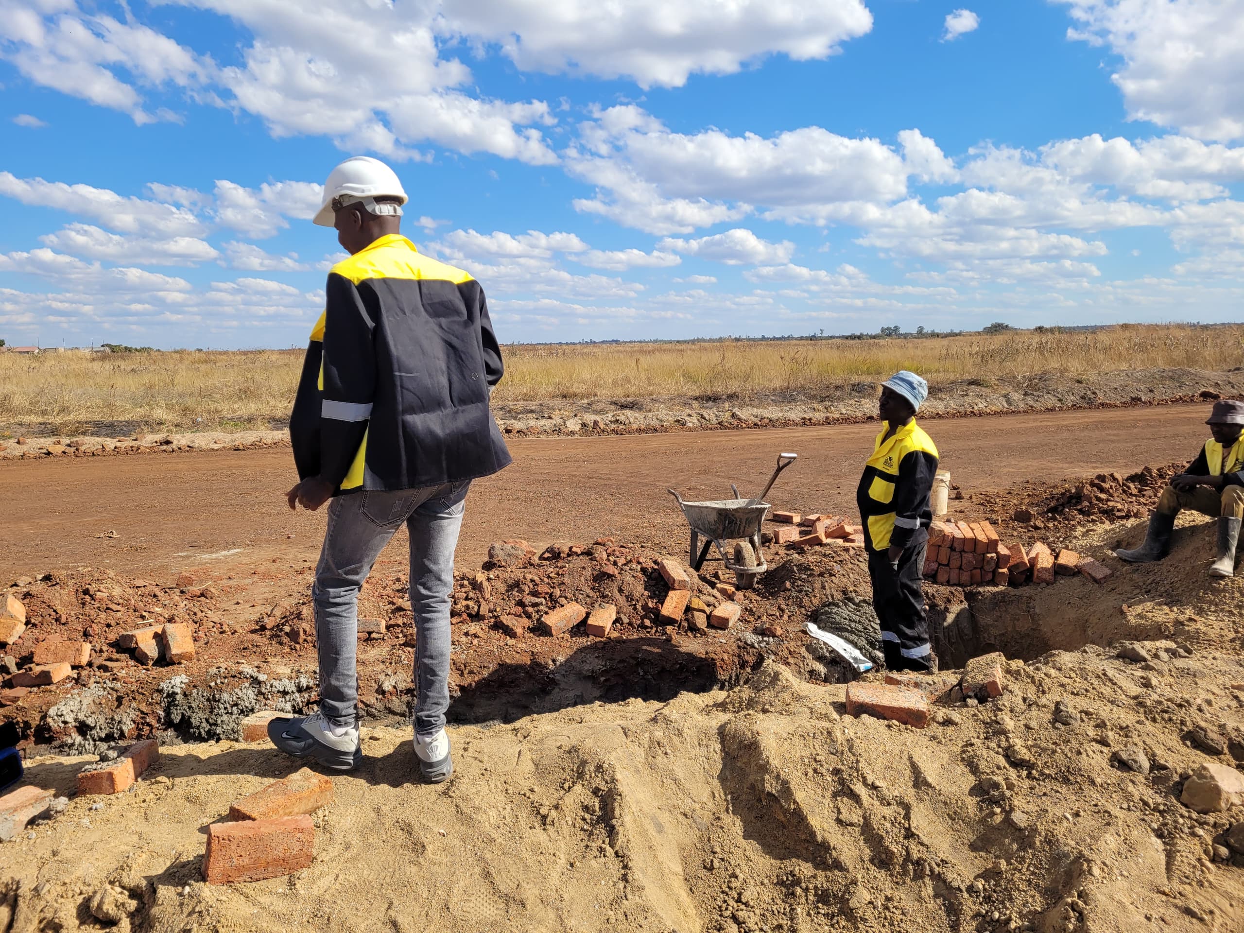 Project team on site — infrastructure and land prep